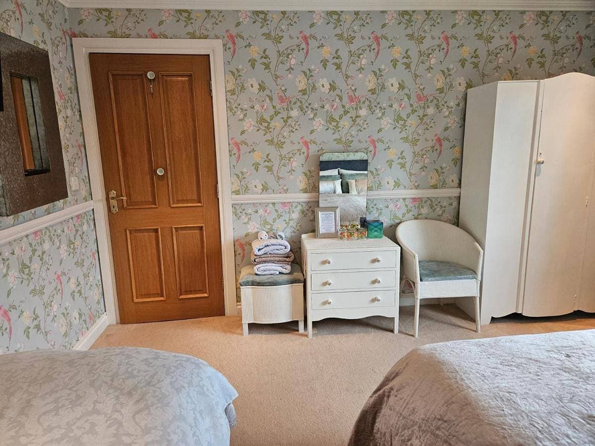 Foto 4 von 24: Superior Triple Room with Private Bathroom