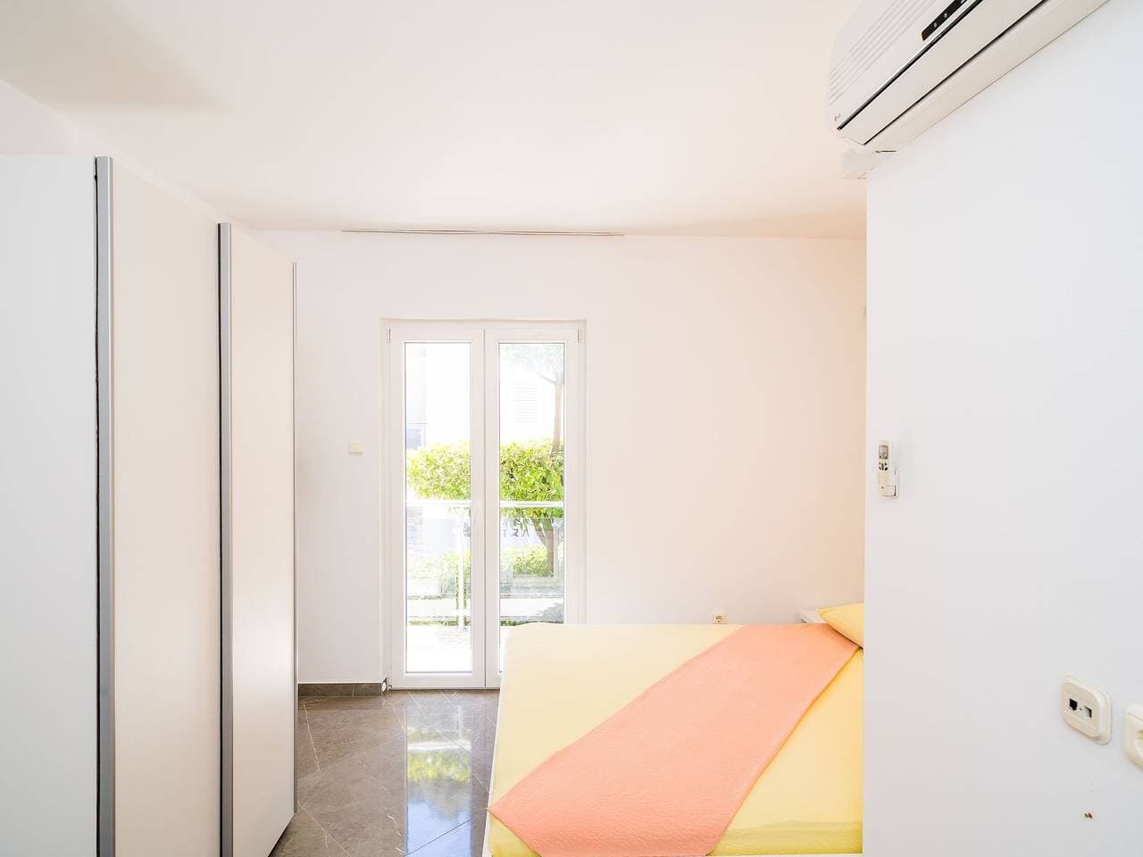 Foto 10 von 22: Apartments & Rooms Barišić-Standard One Bedroom Apartment with Balcony and Garden View(Apt-3)