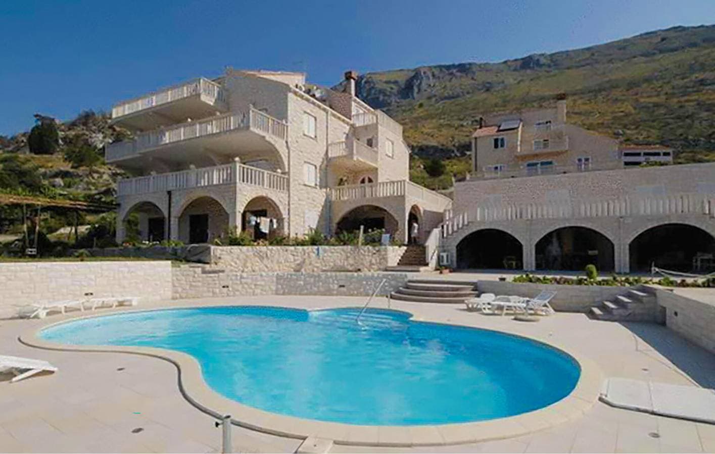 Foto 5 von 20: Apartment mit Meerblick, Pool, Terrasse und nur wenige Schritte vom Strand entfernt