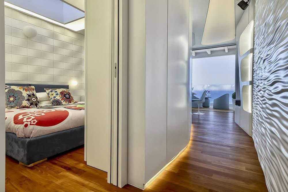 Foto 6 von 30: ClickSardinien Amare Penthouse mit Whirlpool auf Terrasse am Meer