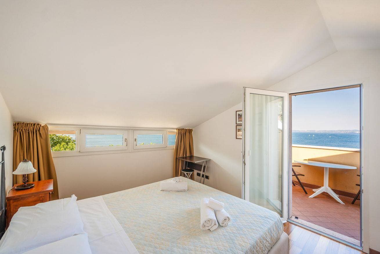 Foto 11 von 25: ApartmentsGarda - Baia Del Garda 5