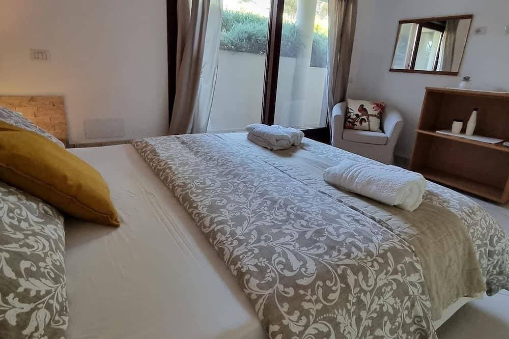 Foto 4 von 30: Villa Luigi_Poggio dei Pini: Unterkunft in einer Villa mit Parkplatz und Wallbox