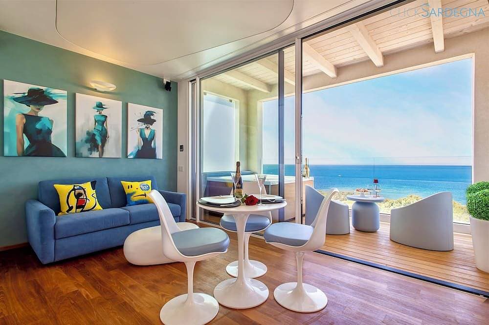 ClickSardinien Amare Penthouse mit Whirlpool auf Terrasse am Meer 1