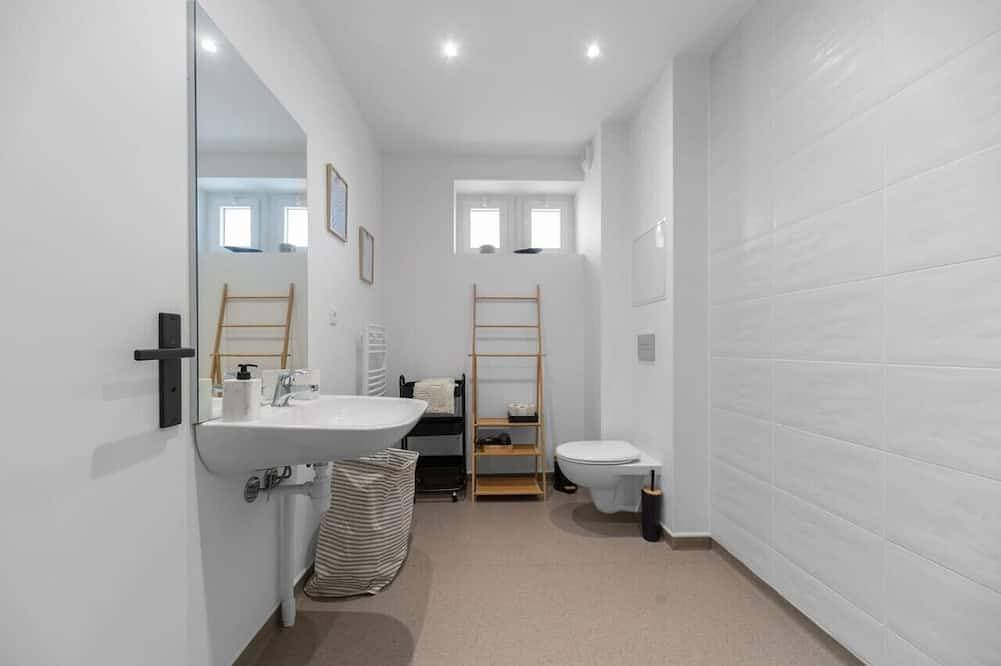 Foto 9 von 30: Grand Appartement design avec parking privé