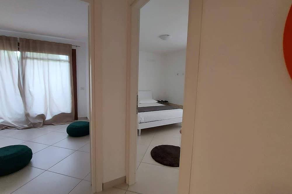 Foto 7 von 30: Villa Luigi_Poggio dei Pini: Unterkunft in einer Villa mit Parkplatz und Wallbox