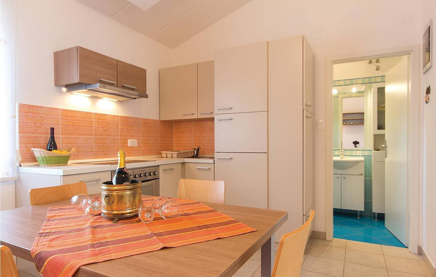 Foto 4 von 18: Charmantes Apartment mit Terrasse, WLAN und Zugang zum Strand in der Nähe von Barbariga