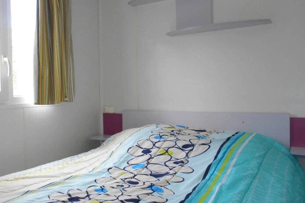 Foto 3 von 17: ZEcamping 3*  club enfant mobil-home TV 17m2 2 pers