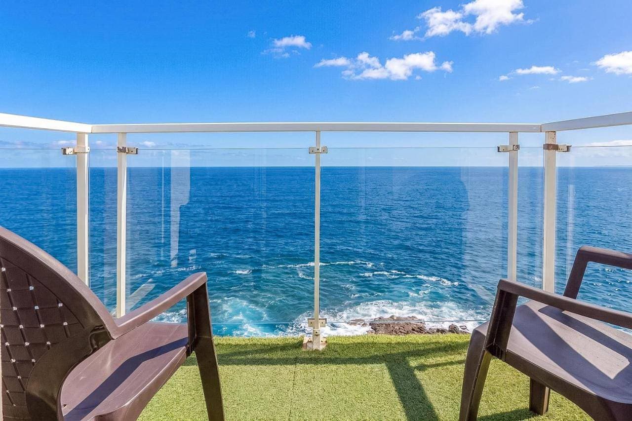 2BR La Furnia Home - Balcony & Natural Pool 1