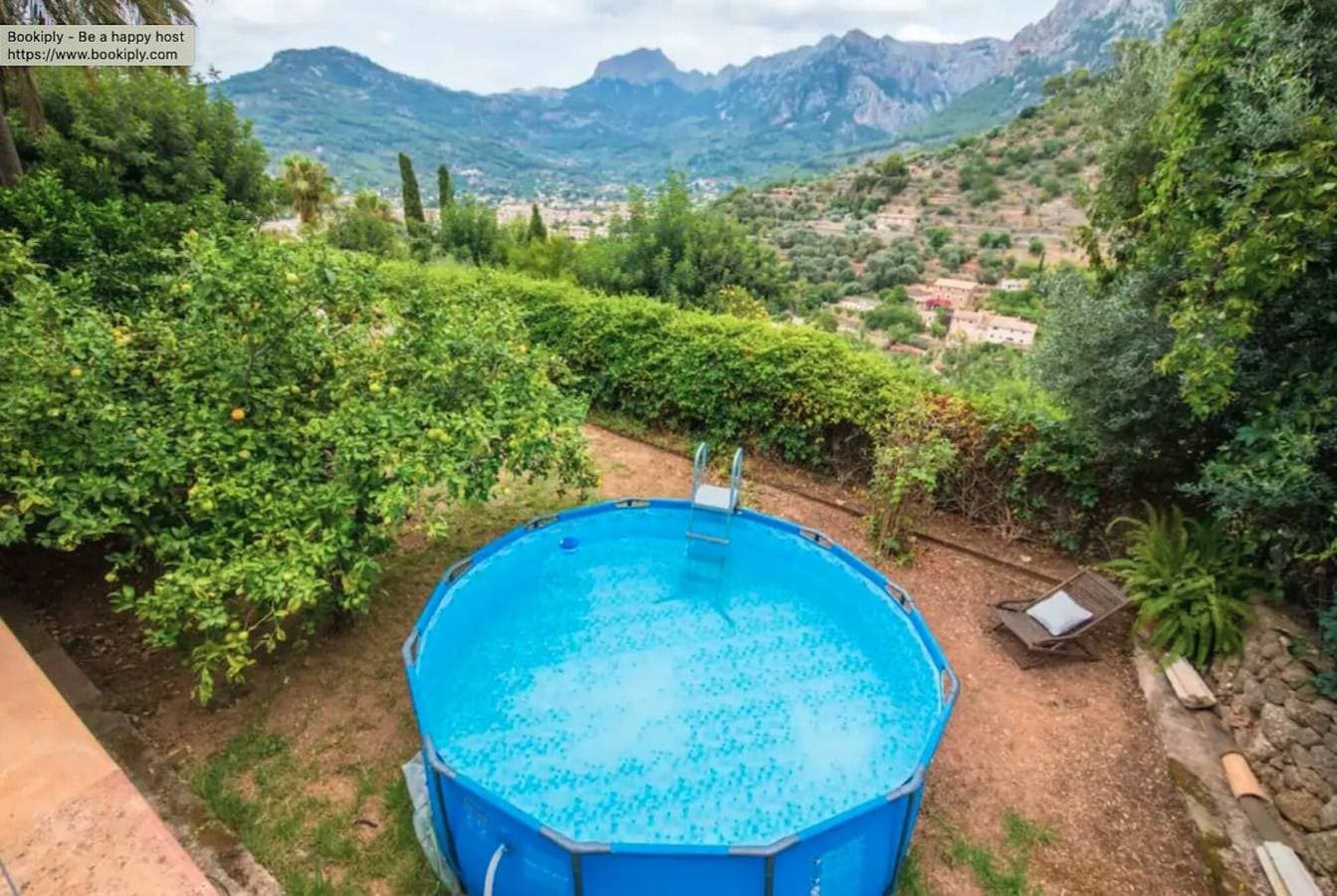 Foto 5 von 43: Ferienhaus Can Garí mit Bergblick, Pool, Terrassen und WLAN