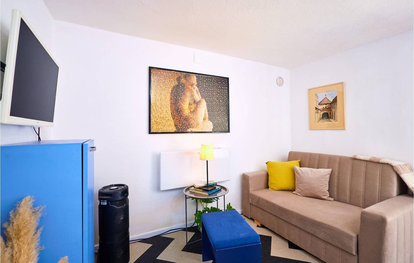 Foto 5 von 22: Charmante 76 m² große Wohnung mit WLAN, Pool, Terrasse und Grill