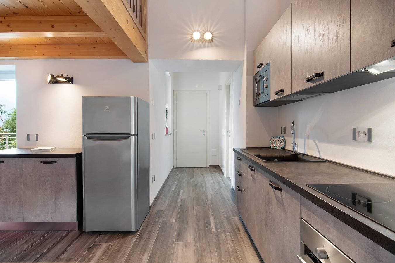 Foto 12 von 26: Ferienhaus 'Jack House' nur wenige Schritte vom See entfernt und mit privatem Parkplatz