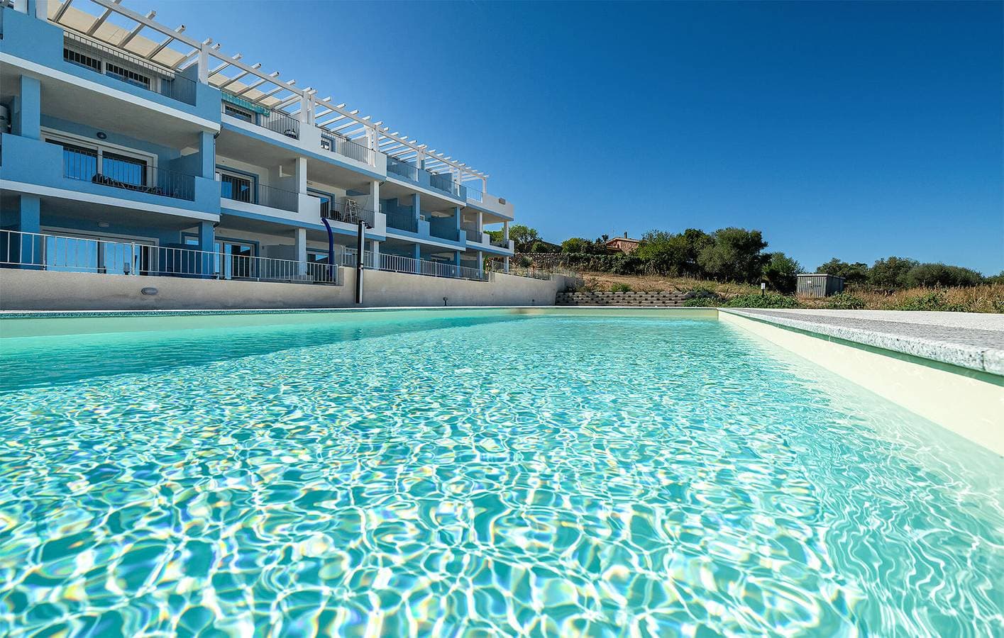 Foto 7 von 22: Apartment mit Meerblick und Pool in der Nähe des Strandes La Marinedda