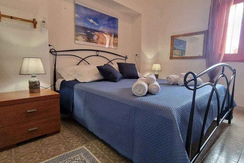 Foto 2 von 30: Casa Vacanze, Stile Campidanese con Tocchi Moderni, a 10 min dal Mare