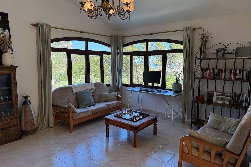 Foto 12 von 30: Ferienhaus 'Villa Port Des Canonge' mit Bergblick, WLAN und Klimaanlage