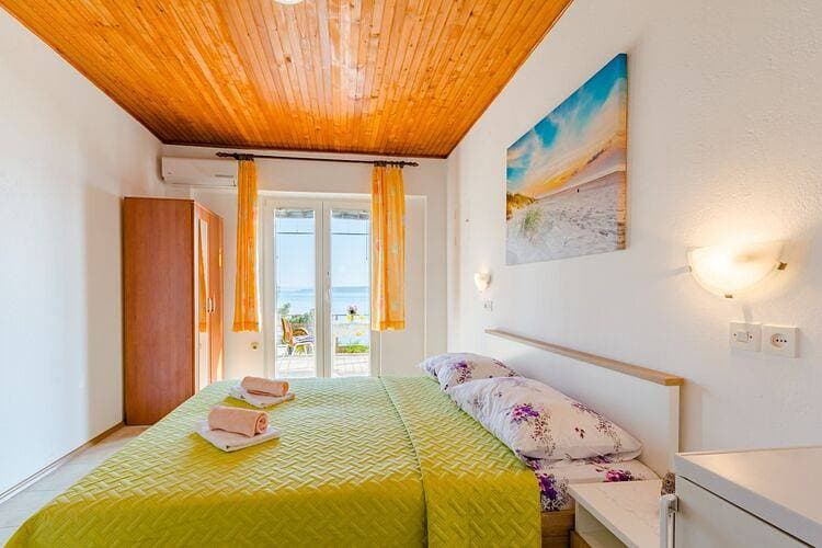 Foto 10 von 18: Rooms Sani - Double Room with Terrace and Sea View (S3)