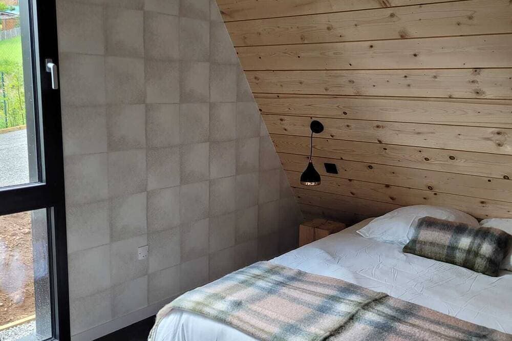 Foto 6 von 30: Delta-Berghütte-Komfort-Ensuite mit Bad