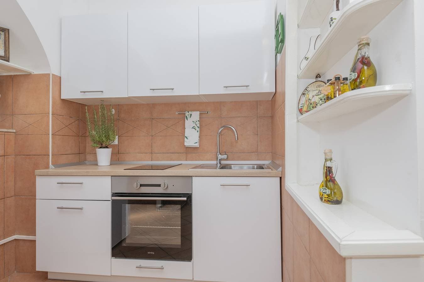 Foto 7 von 20: 2-Zimmer-Ferienwohnung mit Terrasse und Meerblick Baska Voda, Makarska -a
