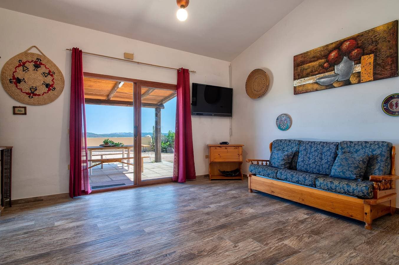 Foto 13 von 30: Ferienwohnung "Panoramico Isola Rossa" mit Meerblick, privater Terrasse und Klimaanlage