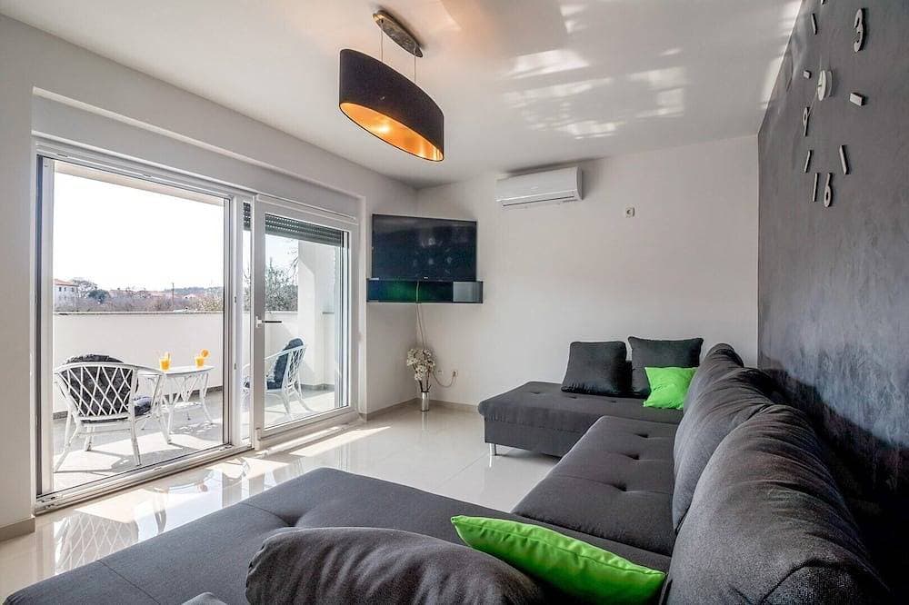 Foto 8 von 23: Comfortable holiday house with apartments / Amazing spacious apartment with patio and grill / A1