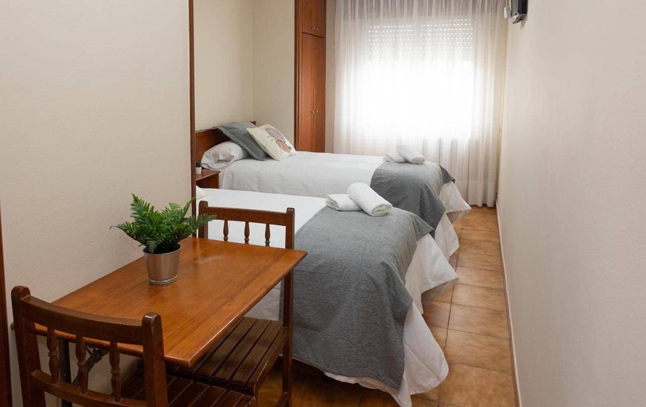 Foto 4 von 14: Double Room with Shared Bathroom