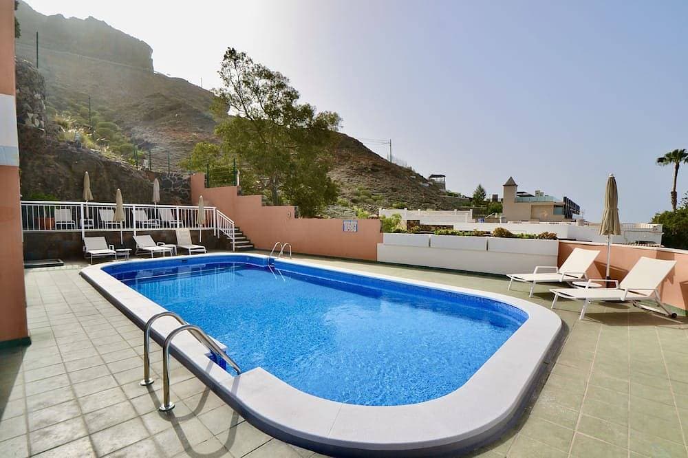 Foto 11 von 17: Apartment with communal swimming pool in Playa de Mogan - Paraiso