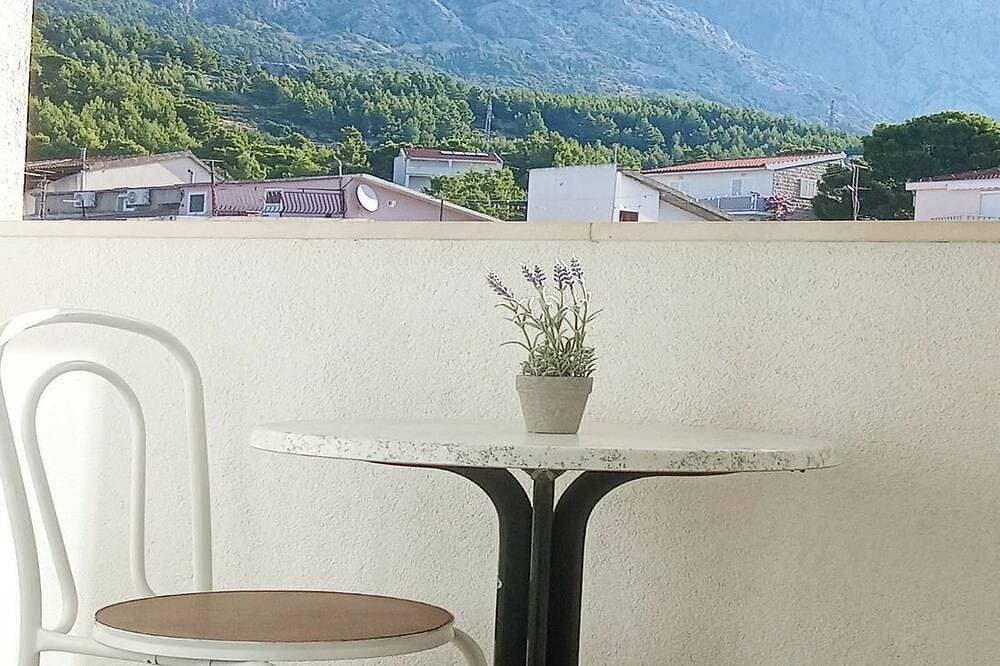Foto 9 von 22: Traumhafte grosse überdachte Meerblick Terrasse – 3 Gehmin. zu Strand u. Zentrum