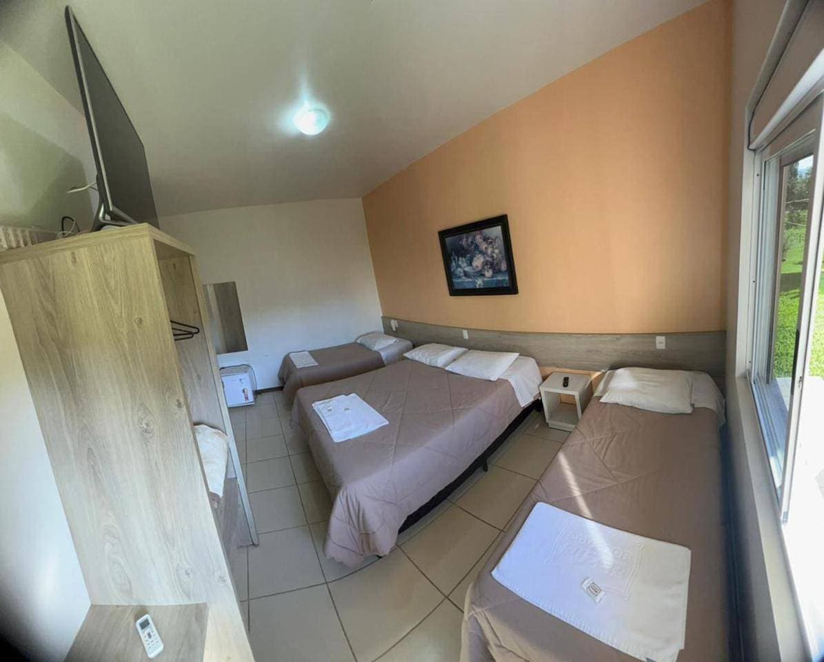 Foto 6 von 13: Triple Room