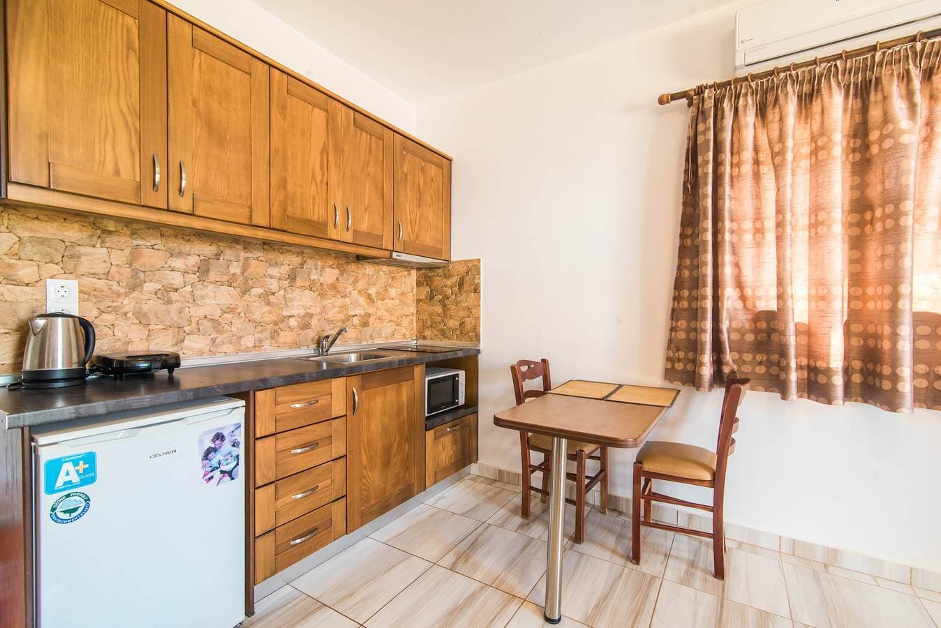 Foto 6 von 23: Mirage Arillas Studio Typ B14' mit Meerblick, Gemeinschaftspool und WLAN