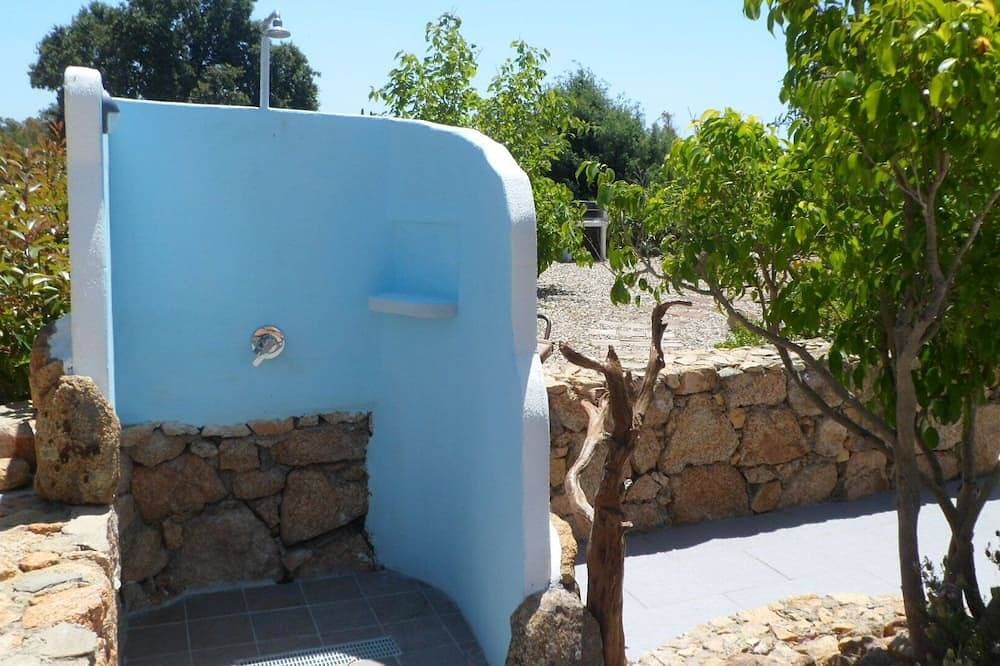 Foto 12 von 27: Casa Niperu in der Landschaft ein paar Meter von den Stränden von Cala Ginepro