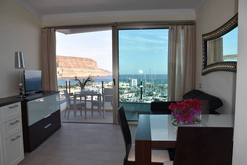 Foto 8 von 30: Apt. 1ºB \"Spectacular views of the sea and the marina of Puerto de Mogán\"