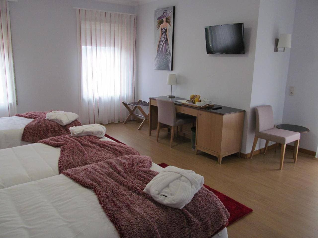 Foto 7 von 9: Triple Room with Balcony