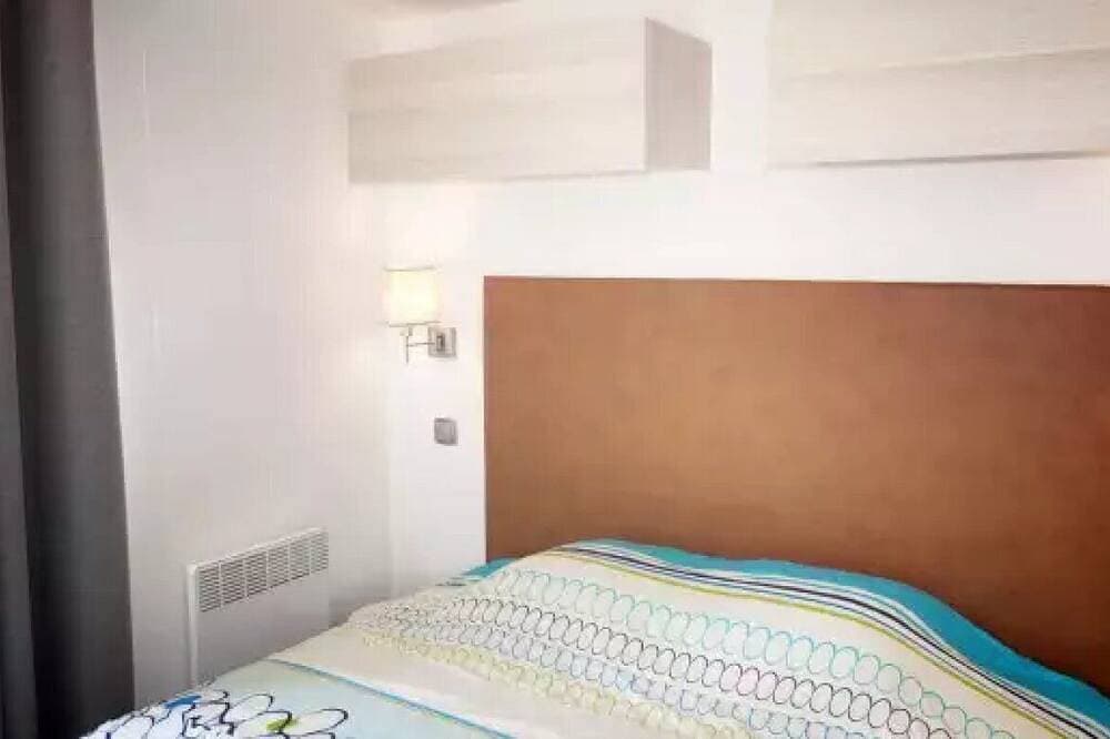 Foto 2 von 14: ZEcamping 4 étoiles piscine extérieur locatif TV Lv clim 20m2 2 pers