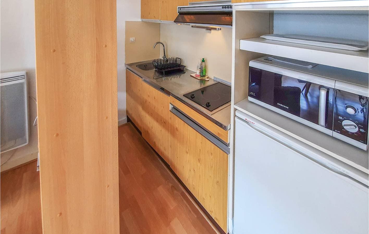 Foto 8 von 26: Modernes Apartment in Strandnähe mit Parkplatz und Kochnische