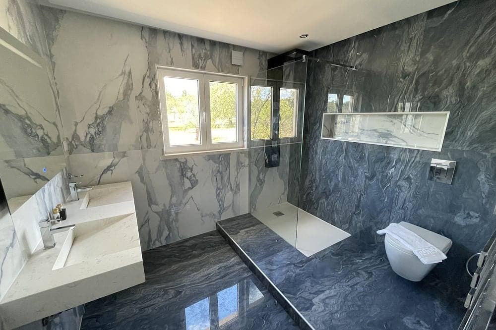 Foto 10 von 30: Luxusvilla, privater beheizter Pool & Gärten mit atemberaubendem Meerblick über Vilamoura