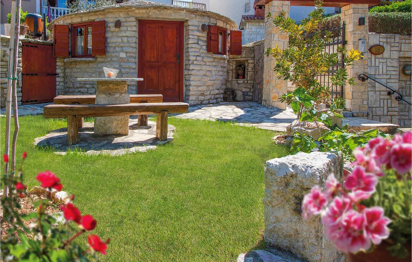 Foto 7 von 30: Charmante Ferienwohnung mit Terrasse, WLAN und Zugang zum Strand – der ideale Urlaubsort!