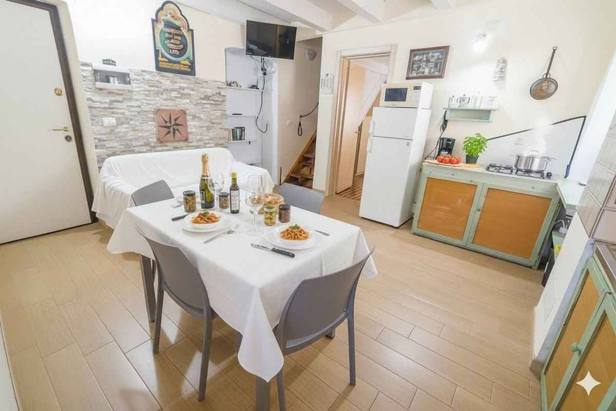 Foto 4 von 13: Ferienwohnung mit Klimaanlage und Dachterrasse mit Meerblick
