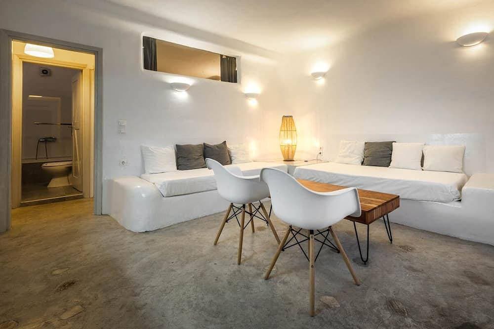 Foto 4 von 30: Neue Superior-Wohnung mit einem Schlafzimmer. Wohnzimmer / Küche / Esszimmer