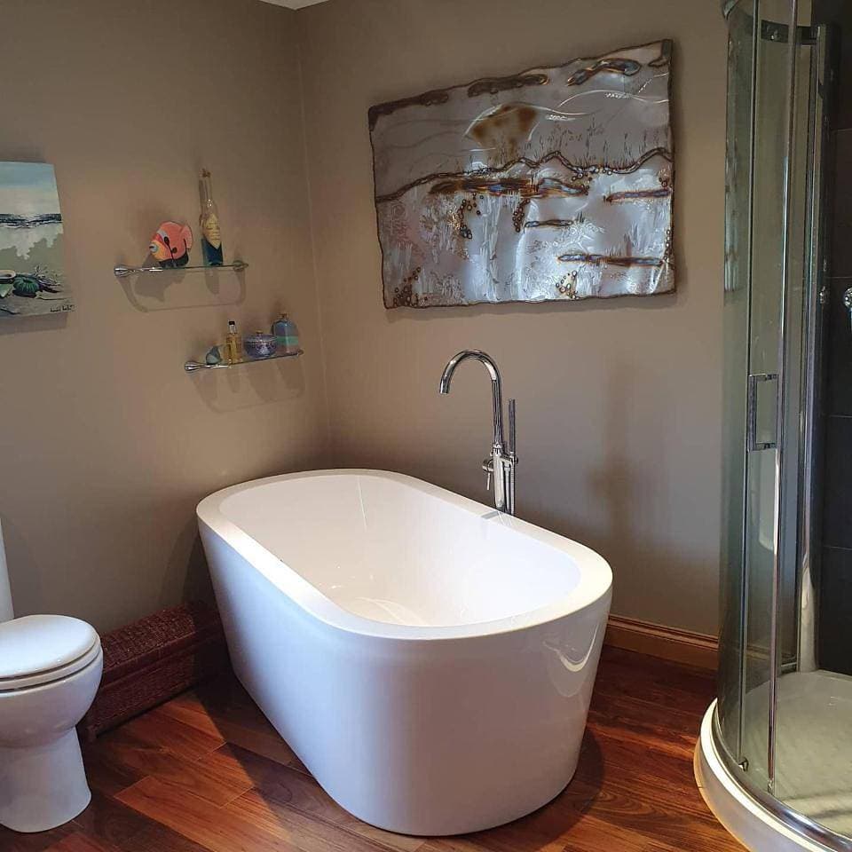 Foto 13 von 24: Superior Triple Room with Private Bathroom