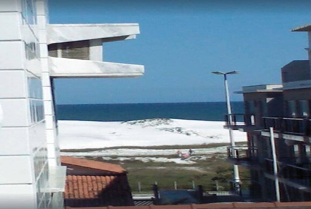 Foto 2 von 11: Near Praia do Forte, Wi-Fi and parking available! Quiet neighborhood! Less than 100 meters from the beach!