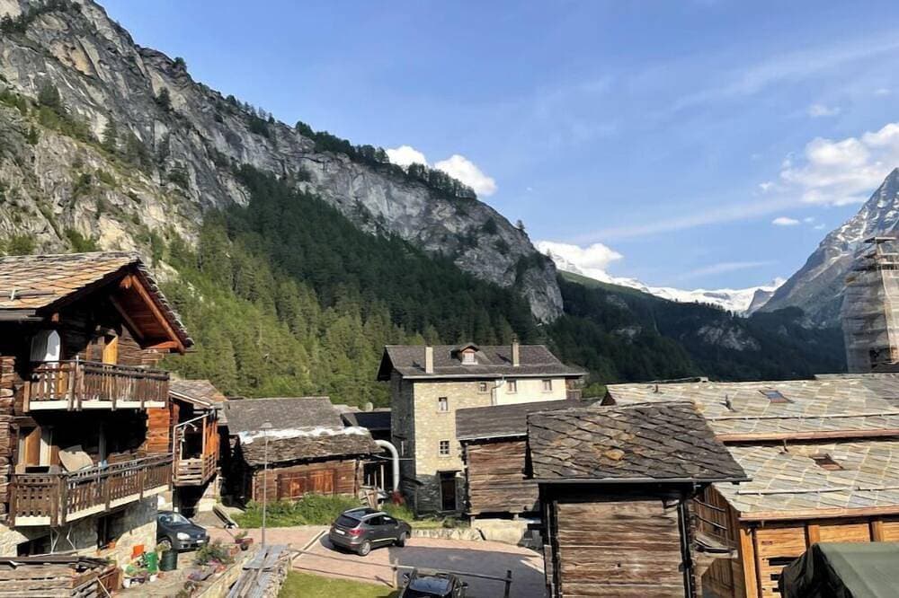 Swiss mountain chalet, wooden interior, cosy, with a beautiful view 1