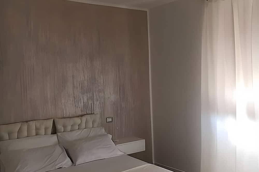 Foto 3 von 15: Zimmer 'Camera Matrimoniale Monica' mit WLAN und Klimaanlage