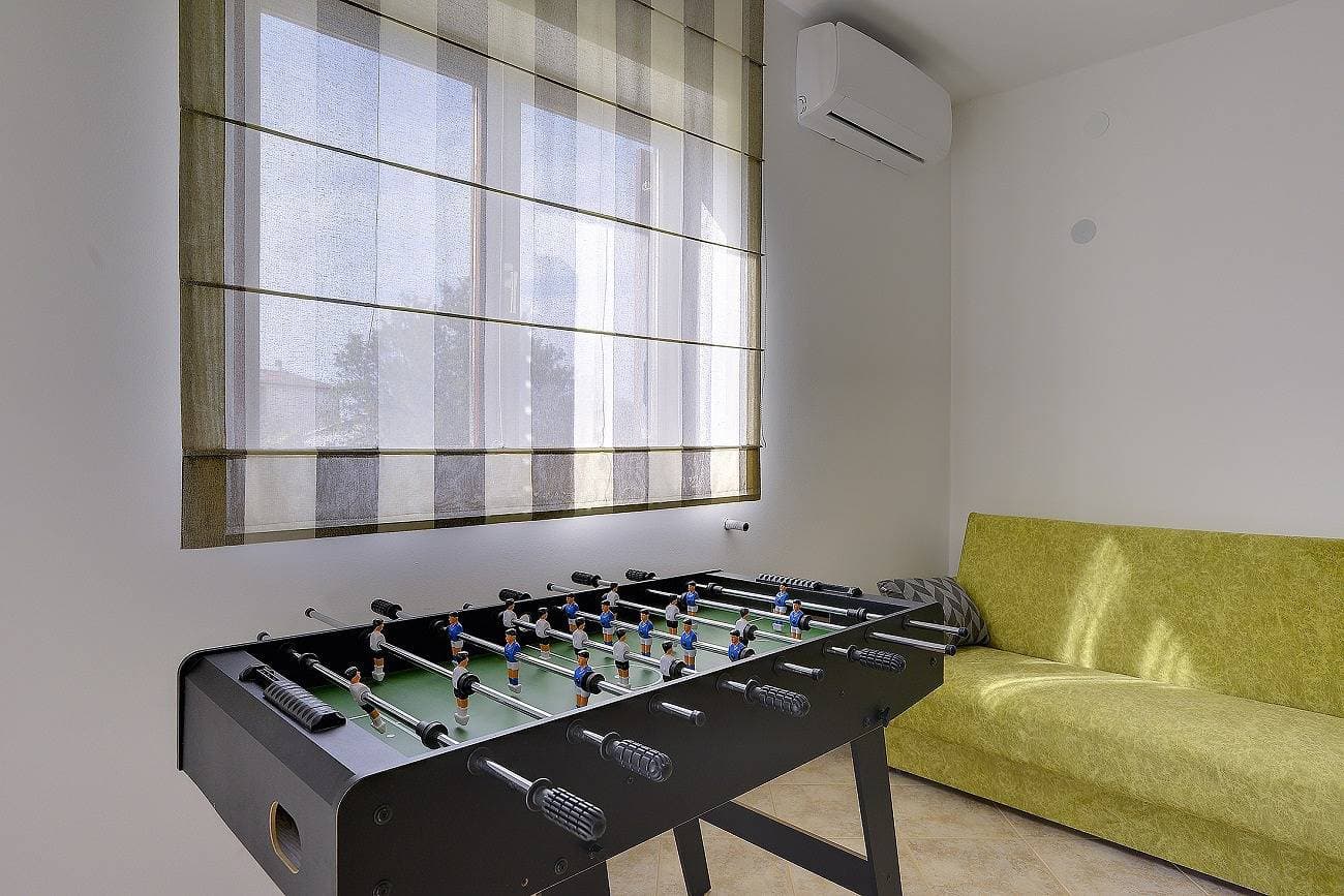 Foto 9 von 21: Neu renovierte Ferienwohnung mit Klima, WLAN, Waschmaschine, Tischfußball, Grill, Fahrräder und einem Kinderspielplatz