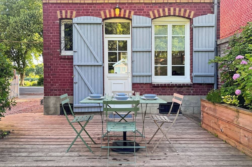 Charmantes Ferienhaus mit Blick auf die Bucht und Garten 1