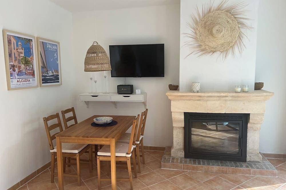 Foto 10 von 29: Ruhig gelegenes 4-Personen Ferienhaus mit Garten, Dachterrasse mit Meerblick