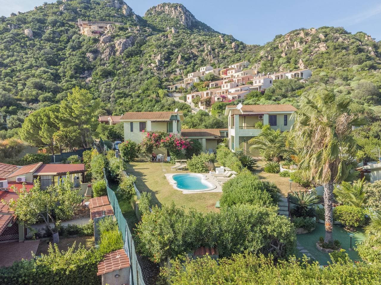Dreifamilienhaus Stella con piscina comune 1
