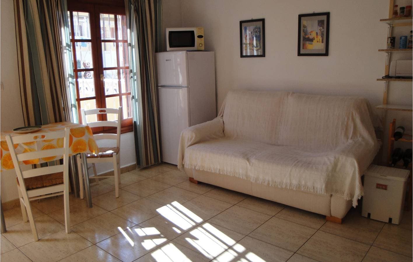 Foto 4 von 13: Terrassenwohnung 1.5km zum Strand mit AC & TV