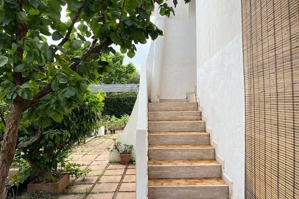 Foto 2 von 10: Villa bifamiliare con giardino  con tre camere da letto a 300 Mt dalla spiaggia