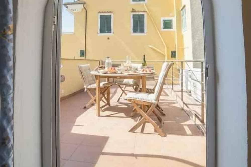 Foto 6 von 13: Ferienwohnung mit Klimaanlage und Dachterrasse mit Meerblick