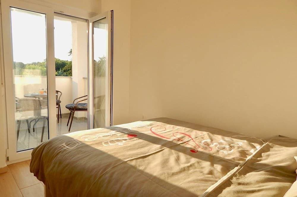 Foto 4 von 25: Comfortable holiday house with apartments / Beautiful first floor apartment with terrace and grill / A3