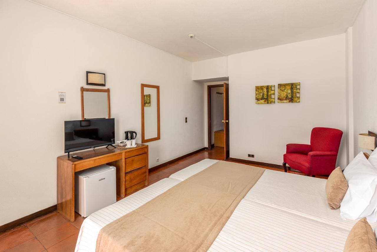 Foto 7 von 9: Standard Twin Room with Garden View
